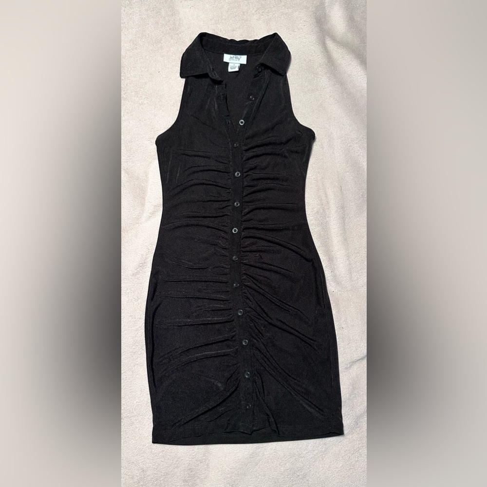 Black, knee length, sleeveless dress with collar by Just Polly